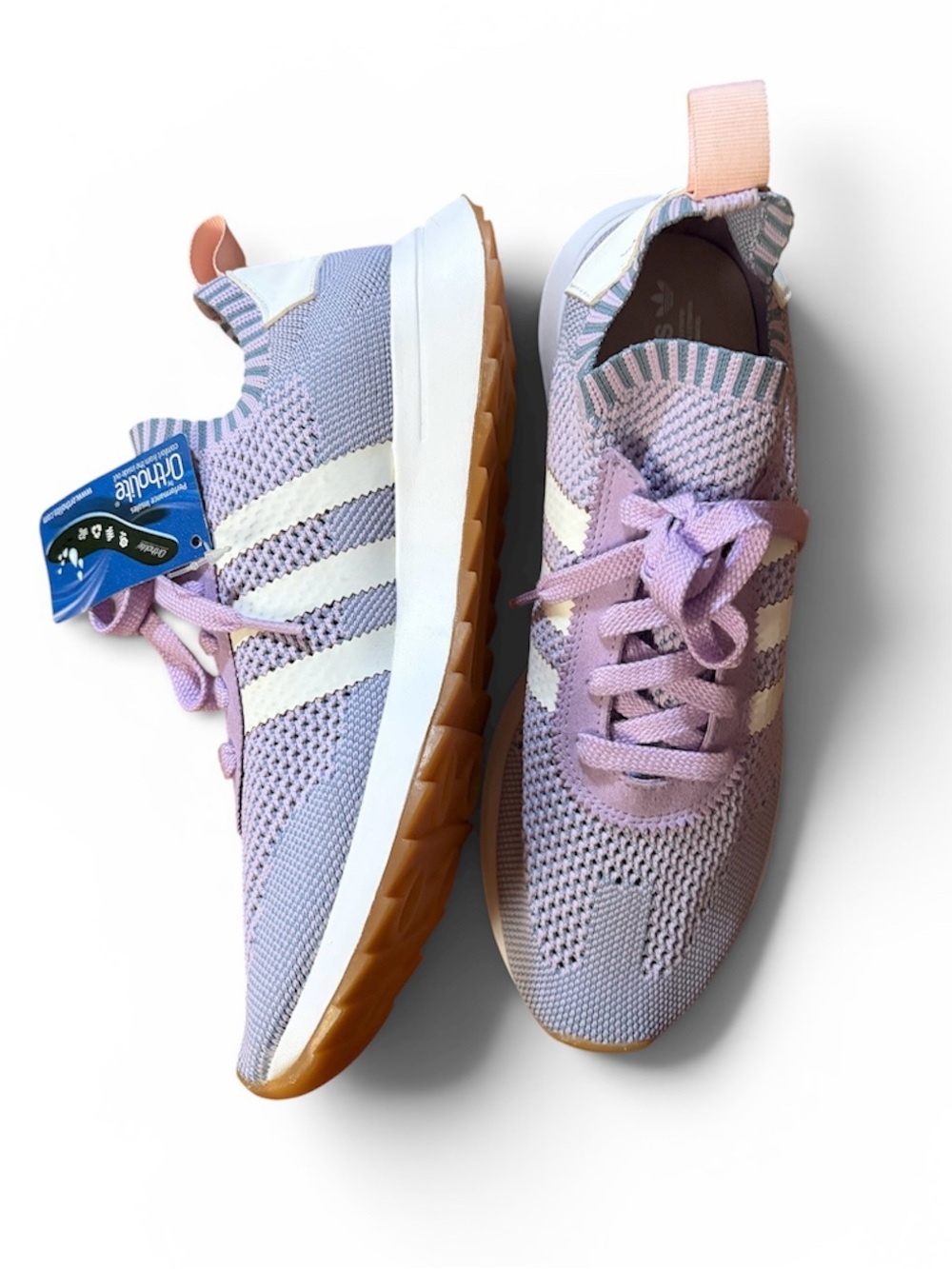 Adidas Flashback Primeknit sneakers in the "Purple Glow" colorway.